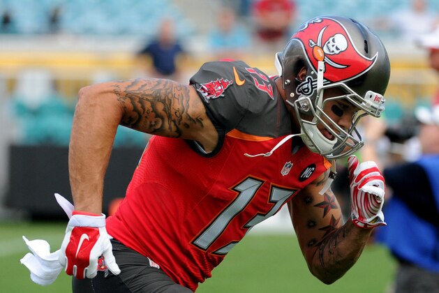 Aug 8, 2014; Jacksonville, FL, USA; Tampa Bay Buccaneers wide receiver Mike Evans (13) warms up prior to the preseason game against the Jacksonville Jaguars at EverBank Field. Mandatory Credit: Melina Vastola-USA TODAY Sports