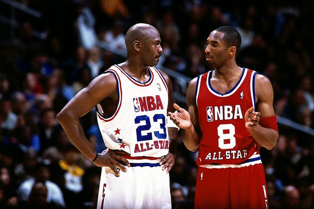 ATLANTA - FEBRUARY 9:  Kobe Bryant #8 of the Western Conference All Stars talks with Michael Jordan #23 of the Eastern conference All Stars during the 2003 NBA All-Star Game at the Phillips Arena on February 9, 2003 in Atlanta, Georgia.  The West won 155-145 in the first ever double-overtime All-Star Game.  NOTE TO USER: User expressly acknowledges and agrees that, by downloading and/or using this Photograph, User is consenting to the terms and conditions of the Getty Images License Agreement.  Mandatory Copyright Notice:  Copyright 2003 NBAE  (Photo by Andrew D. Bernstein/NBAE/Getty Images)