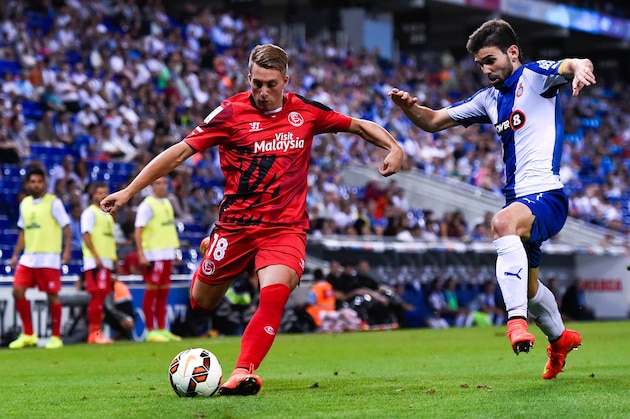 BARCELONA, SPAIN - AUGUST 30:  Gerard Deulofeu of Sevilla FC duels for the ball with Victor Alvarez of RCD Espanyol during the La Liga Match between RCD Espanyol and Sevilla FC at Cornella-El Prat Stadium on August 30, 2014 in Barcelona, Spain.  (Photo by David Ramos/Getty Images)