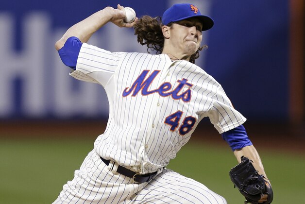 New York Mets' Jacob deGrom (48) delivers a pitch during the first inning of a baseball game against the Colorado Rockies Tuesday, Sept. 9, 2014, in New York.  (AP Photo/Frank Franklin II)