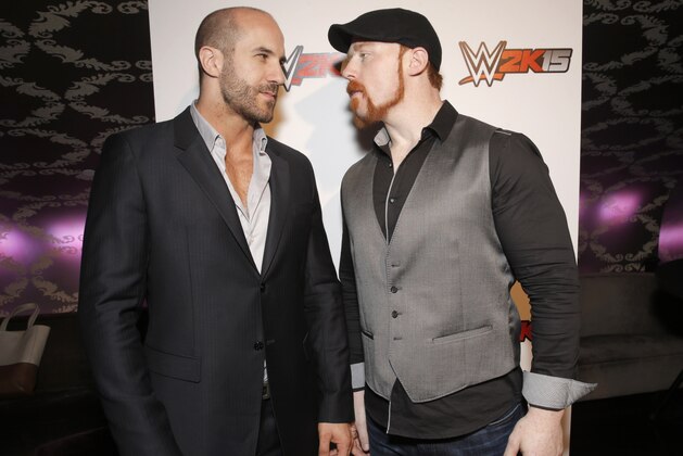 IMAGE DISTRIBUTED FOR 2K - WWE Superstars Cesaro and Sheamus engage in a friendly stare down at the SummerSlam Confidential Panel for the WWE 2K15 roster reveal at Club Nokia, on Saturday, August 16, 2014 in Los Angeles. (Photo by Todd Williamson/Invision for 2K/AP Images)