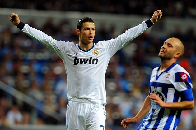 MADRID, SPAIN - SEPTEMBER 30:  Cristiano Ronaldo of Real Madrid CF celebrates scoring his team's fifth goal during the La Liga match between Real Madrid CF and RC Deportivo La Coruna at Bernabeu on September 30, 2012 in Madrid, Spain.  (Photo by Gonzalo Arroyo Moreno/Getty Images)
