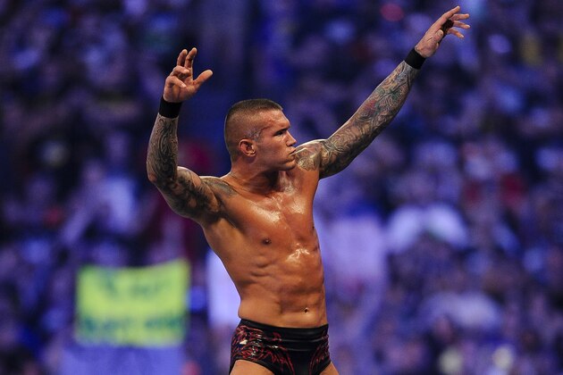 WWE Superstar Randy Orton celebrates defeating CM Punk (not pictured) during WrestleMania XXVII at the Georgia Dome in Atlanta, Georgia on Sunday, April 3, 2011. (Paul Abell/AP Images for WWE)
