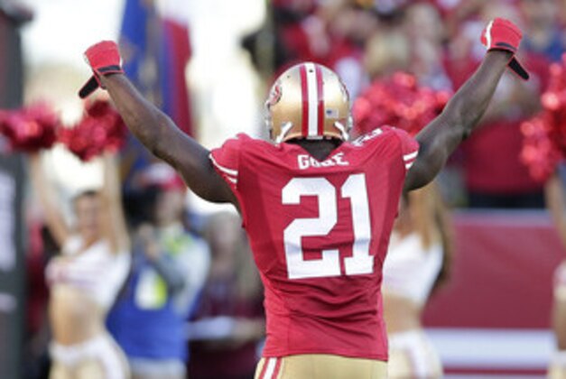 San Francisco 49ers running back Frank Gore (21) is introduced before an NFL football game against the Chicago Bears in Santa Clara, Calif., Sunday, Sept. 14, 2014. (AP Photo/Marcio Jose Sanchez)