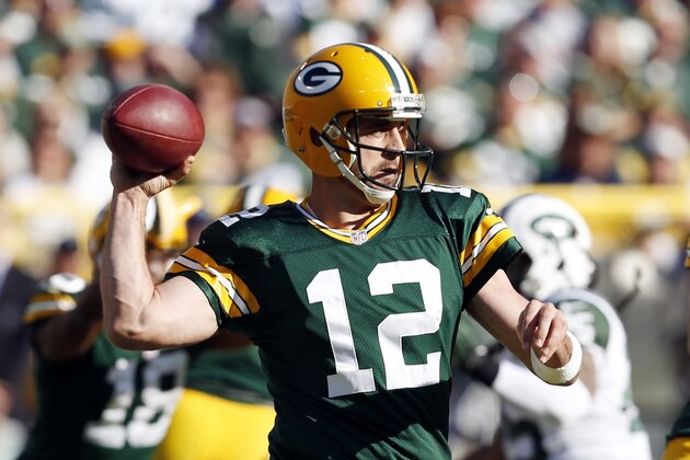 Green Bay Packers' Aaron Rodgers during the first half of an NFL football game against the New York Jets Sunday, Sept. 14, 2014, in Green Bay, Wis. (AP Photo/Mike Roemer)