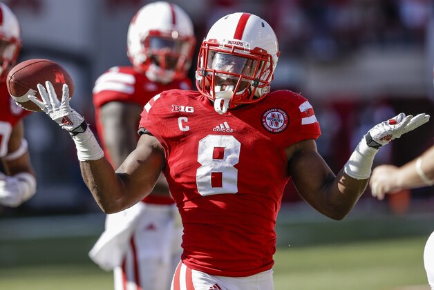 Nebraska running back Ameer Abdullah (8) reacts to a call by a referee in the second half of an NCAA college football game against Florida Atlantic in Lincoln, Neb., Saturday, Aug. 30, 2014. (AP Photo/Nati Harnik)
