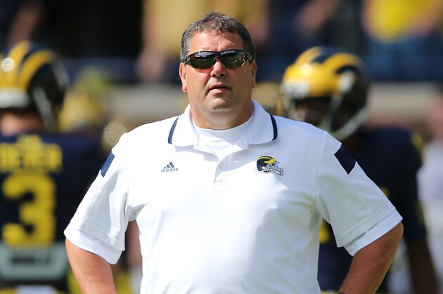ANN ARBOR, MI - SEPTEMBER 13: Head Football Coach Brady Hoke watches the warms up prior to the start of the game between the Miami University Redhawks and the Michigan Wolverines at Michigan Stadium on September 13, 2014 in Ann Arbor, Michigan. the Wolverines defeated the Redhawks 34-10. (Photo by Leon Halip/Getty Images) ANN ARBOR, MI - SEPTEMBER 13: Head Football Coach Brady Hoke watches the warms up prior to the start of the game between the Miami University Redhawks and the Michigan Wolverines at Michigan Stadium on September 13, 2014 in Ann Arbor, Michigan. the Wolverines defeated the Redhawks 34-10. (Photo by Leon Halip/Getty Images)