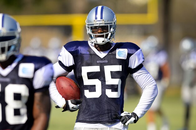 Dallas Cowboys linebacker Rolando McClain watches during the NFL football team's training camp, Saturday, July 26, 2014, in Oxnard, Calif. (AP Photo/Gus Ruelas)