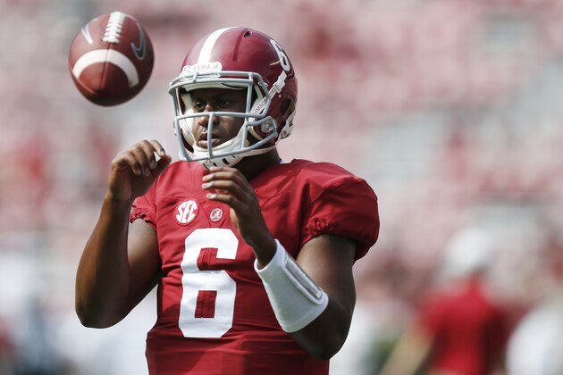 Alabama quarterback Blake Sims (6) catches the ball during warmups before the first half of an NCAA college football game against Florida Atlantic Saturday, Sept. 6, 2014, in Tuscaloosa, Ala. (AP Photo/Brynn Anderson)
