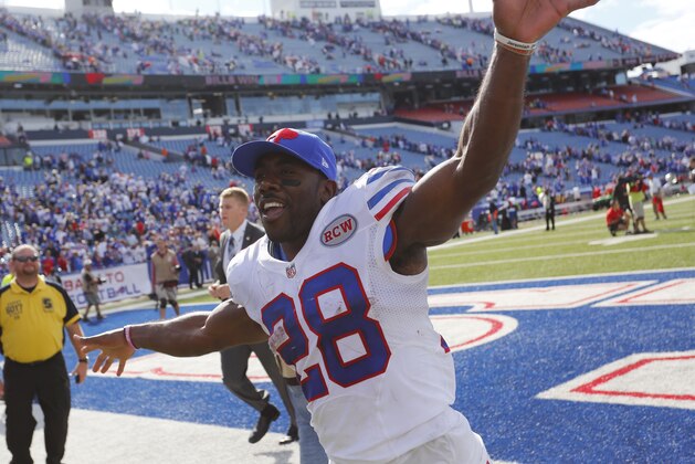 Buffalo Bills running back C.J. Spiller (28) runs off the field after their 29-10 victory over the Miami Dolphins in an NFL football game, Sunday, Sept. 14, 2014, in Orchard Park, N.Y. (AP Photo/Bill Wippert)