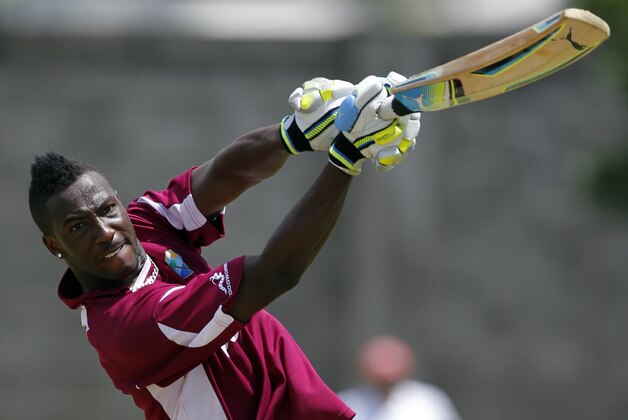 West Indies' Andre Russell bats during a practice session in Kingstown, St. Vincent, Thursday March 15, 2012. Australia and the West Indies square off in the first of five One Day International cricket matches starting on Friday. (AP Photo/Andres Leighton)