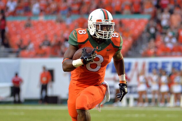Sep 6, 2014; Miami Gardens, FL, USA; Miami Hurricanes running back Duke Johnson (8) runs with the ball against Florida A&M Rattlers during their game at Sun Life Stadium. Mandatory Credit: Steve Mitchell-USA TODAY Sports