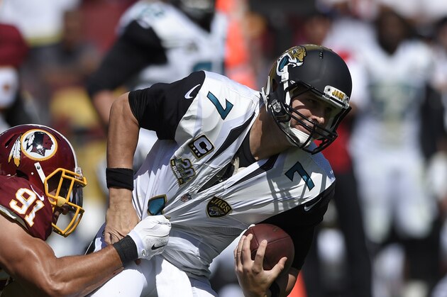 Washington Redskins outside linebacker Ryan Kerrigan (91) sacks Jacksonville Jaguars quarterback Chad Henne (7) during the first half of an NFL football game Sunday, Sept. 14, 2014, in Landover, Md. (AP Photo/Nick Wass)