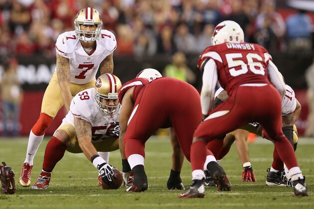 GLENDALE, AZ - DECEMBER 29: Quarterback Colin Kaepernick #7 of the San Francisco 49ers prepares to snap the football during the NFL game against the Arizona Cardinals at the University of Phoenix Stadium on December 29, 2013 in Glendale, Arizona. The 49ers defeated the Cardinals 23-20. (Photo by Christian Petersen/Getty Images) GLENDALE, AZ - DECEMBER 29: Quarterback Colin Kaepernick #7 of the San Francisco 49ers prepares to snap the football during the NFL game against the Arizona Cardinals at the University of Phoenix Stadium on December 29, 2013 in Glendale, Arizona. The 49ers defeated the Cardinals 23-20. (Photo by Christian Petersen/Getty Images)