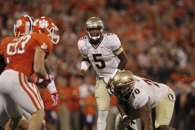 Florida State quarterback Jameis Winston (5) works against Clemson during the first half of an NCAA college football game, Saturday, Oct. 19, 2013, in Clemson, S.C. (AP Photo/Mike Stewart)