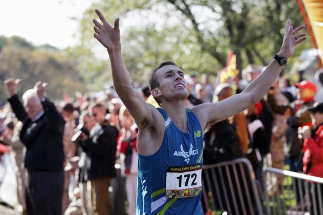Air Force 2nd Lt. Jacob Bradosky of Centerville, Ohio, reacts as he wins the Marine Corps Marathon in Arlington, Va., Sunday, Oct. 31, 2010. (AP Photo/Carolyn Kaster)