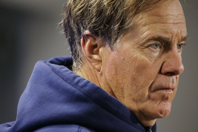 New England Patriots head coach Bill Belichick listens to a reporter's question during a media availability at the NFL football team's facility Wednesday, Sept. 17, 2014 in Foxborough, Mass. (AP Photo/Stephan Savoia)