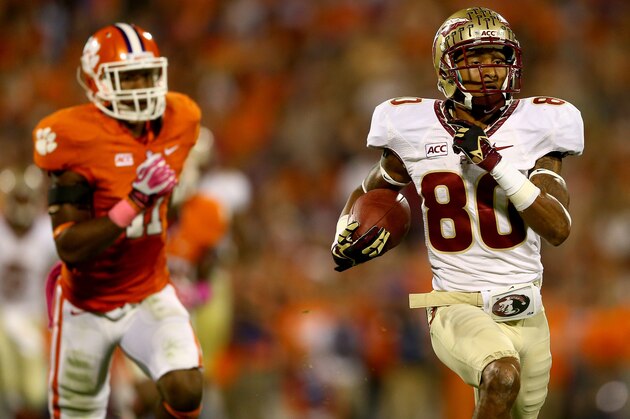 CLEMSON, SC - OCTOBER 19:  Rashad Greene #80 of the Florida State Seminoles runs for a touchdown during their game against the Clemson Tigers at Memorial Stadium on October 19, 2013 in Clemson, South Carolina.  (Photo by Streeter Lecka/Getty Images)