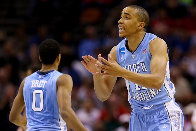 SAN ANTONIO, TX - MARCH 23:  Brice Johnson #11 of the North Carolina Tar Heels reacts against the Iowa State Cyclones during the third round of the 2014 NCAA Men's Basketball Tournament at the AT&T Center on March 23, 2014 in San Antonio, Texas.  (Photo by Ronald Martinez/Getty Images)