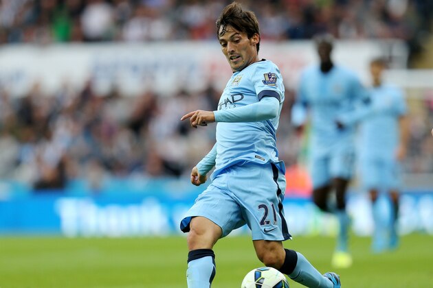 Manchester City's David Silva control's the ball during their English Premier League soccer match against Newcastle United at St James' Park, Newcastle, England, Sunday, Aug. 17, 2014. (AP Photo/Scott Heppell)