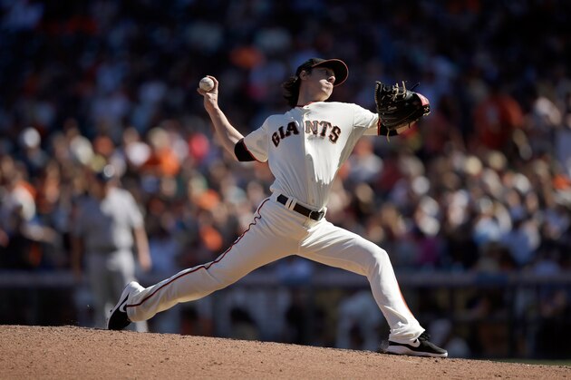 SAN FRANCISCO, CA - AUGUST 31:  Tim Lincecum #55 of the San Francisco Giants pitches in relief against the Milwaukee Brewers at AT&T Park on August 31, 2014 in San Francisco, California.  (Photo by Ezra Shaw/Getty Images)