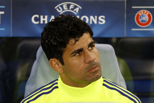 Chelsea's Diego Costa sits on the bench during the Champions League Group G soccer match between Chelsea and Schalke 04 at Stamford Bridge stadium in London Wednesday, Sept. 17, 2014. (AP Photo/Kirsty Wigglesworth)