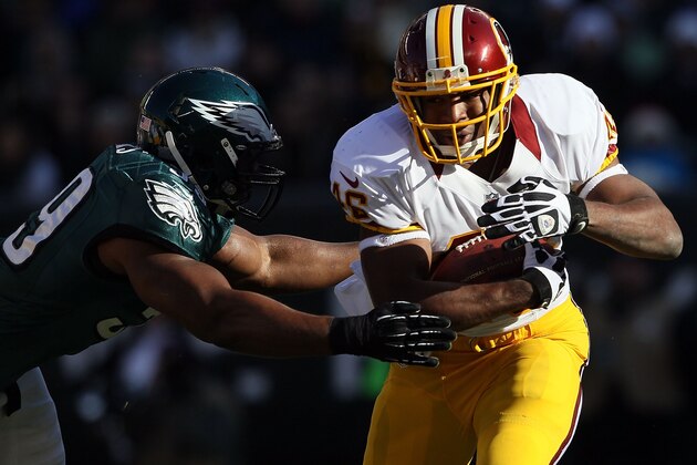 PHILADELPHIA, PA - DECEMBER 23: Alfred Morris #46 of the Washington Redskins runs with the ball as DeMeco Ryans #59 of the Philadelphia Eagles makes the tackle at Lincoln Financial Field on December 23, 2012 in Philadelphia, Pennsylvania.  (Photo by Alex Trautwig/Getty Images)