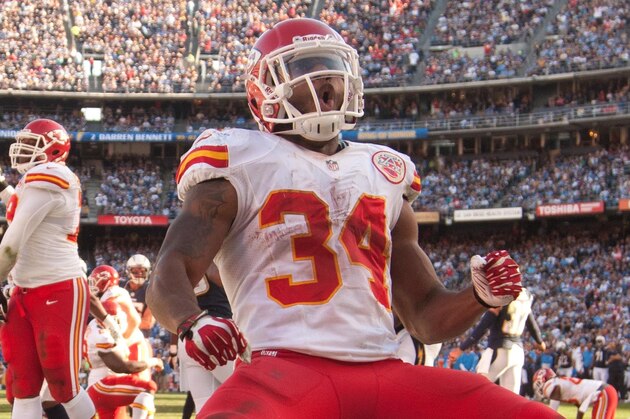 Dec 29, 2013; San Diego, CA, USA;  Kansas City Chiefs running back Knile Davis (34) celebrates a touchdown during the Chiefs 27-24 overtime loss to the San Diego Chargers at Qualcomm Stadium. Mandatory Credit: Stan Liu-USA TODAY Sports
