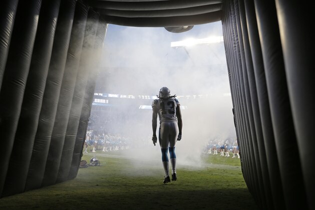 Carolina Panthers' Kelvin Benjamin (13) is introduced before a preseason NFL football game against the Kansas City Chiefs in Charlotte, N.C., Sunday, Aug. 17, 2014. (AP Photo/Chuck Burton)