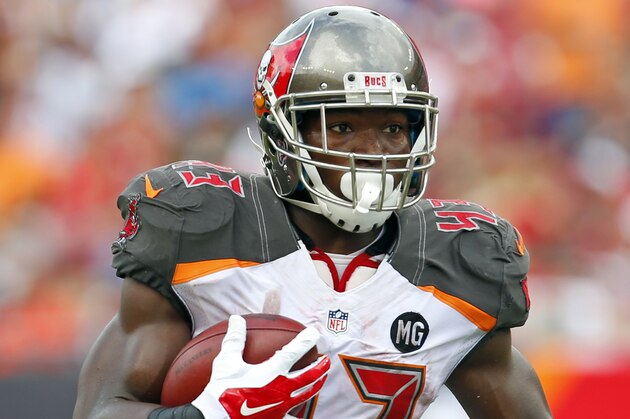 Tampa, Fla. Bay Buccaneers running back Bobby Rainey (43) runs against the St. Louis Rams during an NFL game at Raymond James Stadium in Tampa, Fla. on Sunday, Sept. 14, 2014. (Jeff Haynes/AP Images for Panini)