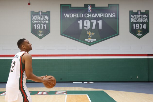 ST. FRANCIS, WI - JUNE 28:  Jabari Parker #12 of the Milwaukee Bucks poses for a portrait at the Bucks Training Center on June 28, 2014 in St. Francis, Wisconsin. NOTE TO USER:  User expressly acknowledges and agrees that, by downloading and or using this Photograph, user is consenting to the terms and conditions of the Getty Images License Agreement.  Mandatory Copyright Notice:  Copyright 2014 NBAE (Photo by Jeffrey Phelps/NBAE via Getty Images)