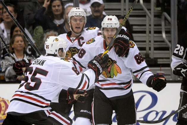 LOS ANGELES, CA - MAY 30: Patrick Kane #88 of the Chicago Blackhawks celebrates with teammates Andrew Shaw #65 and Jonathan Toews #19 of the Chicago Blackhawks after Kane scores a second period goal against the Los Angeles Kings in Game Six of the Western Conference Final during the 2014 Stanley Cup Playoffs at Staples Center on May 30, 2014 in Los Angeles, California. (Photo by Harry How/Getty Images) LOS ANGELES, CA - MAY 30: Patrick Kane #88 of the Chicago Blackhawks celebrates with teammates Andrew Shaw #65 and Jonathan Toews #19 of the Chicago Blackhawks after Kane scores a second period goal against the Los Angeles Kings in Game Six of the Western Conference Final during the 2014 Stanley Cup Playoffs at Staples Center on May 30, 2014 in Los Angeles, California. (Photo by Harry How/Getty Images)