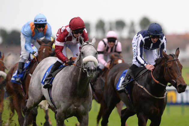 AYR,  SCOTLAND - SEPTEMBER 21: Oisin Murphy (burgundy and White) riding Silver Rime wins the Microtech Support Handicap Stakes at Ayr racecourse on September 21, 2013 in Ayr, Scotland. (Photo by Mark Runnacles/Getty Images)