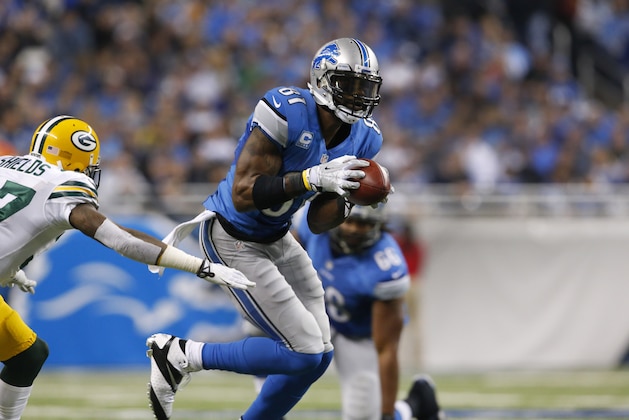 Detroit Lions wide receiver Calvin Johnson (81) catches a ball against the Green Bay Packers during the third quarter of an NFL football game at Ford Field in Detroit, Thursday, Nov. 28, 2013. (AP Photo/Paul Sancya)