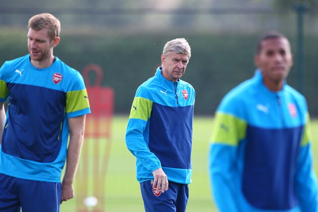 ST ALBANS, ENGLAND - SEPTEMBER 15: XX during a Arsenal Training Session ahead of their Champions League fixture against Borussia Dortmund on September 15, 2014 in St Albans, England. (Photo by Charlie Crowhurst/Getty Images)
