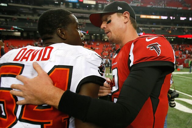 ATLANTA, GA - OCTOBER 20:  Matt Ryan #2 of the Atlanta Falcons is congratulated by Lavonte David #54 of the Tampa Bay Buccaneers after their 31-23 win at Georgia Dome on October 20, 2013 in Atlanta, Georgia.  (Photo by Kevin C. Cox/Getty Images)