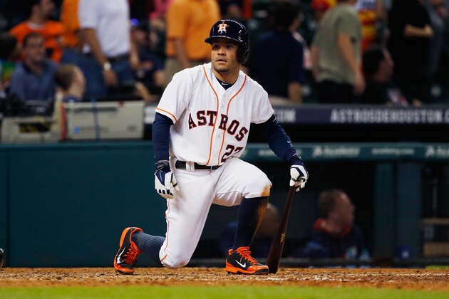 HOUSTON, TX - SEPTEMBER 17:  Jose Altuve #27 of the Houston Astros sits at home plate during the ninth inning against the Cleveland Indians during their game at Minute Maid Park on September 17, 2014 in Houston, Texas.  (Photo by Scott Halleran/Getty Images)