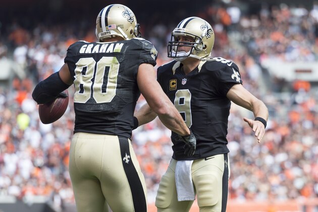 CLEVELAND, OH - SEPTEMBER 14: Tight end Jimmy Graham #80 celebrates with quarterback Drew Brees #9 of the New Orleans Saints after the two connected for a touchdown pass during the first half against the Cleveland Browns at FirstEnergy Stadium on September 14, 2014 in Cleveland, Ohio.  (Photo by Jason Miller/Getty Images)