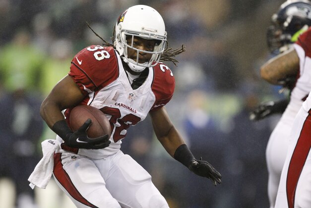 Dec 22, 2013; Seattle, WA, USA; Arizona Cardinals running back Andre Ellington (38) rushes against the Seattle Seahawks during the third quarter at CenturyLink Field. Mandatory Credit: Joe Nicholson-USA TODAY Sports