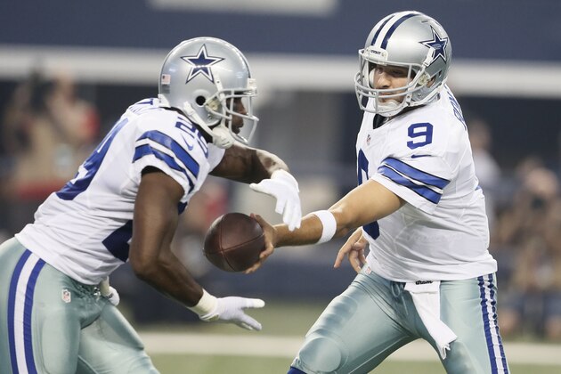 Dallas Cowboys quarterback Tony Romo (9) hands off the ball to running back DeMarco Murray (29) during the first half of an NFL preseason football game against the Baltimore Ravens, Saturday, Aug. 16, 2014, in Arlington, Texas. (AP Photo/Brandon Wade)