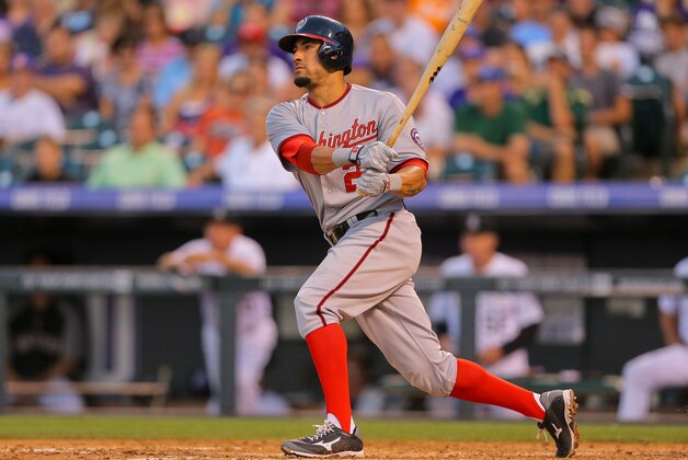 DENVER, CO - JULY 22:  Ian Desmond #20 of the Washington Nationals watches his double during the fifth inning against the Colorado Rockies at Coors Field on July 22, 2014 in Denver, Colorado. Desmond went on to score in the inning. (Photo by Justin Edmonds/Getty Images)