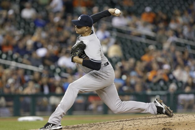 New York Yankees relief pitcher Dellin Betances throws against the Detroit Tigers in the ninth inning of a baseball game in Detroit Wednesday, Aug. 27, 2014. The Yankees won 8-4. (AP Photo/Paul Sancya)