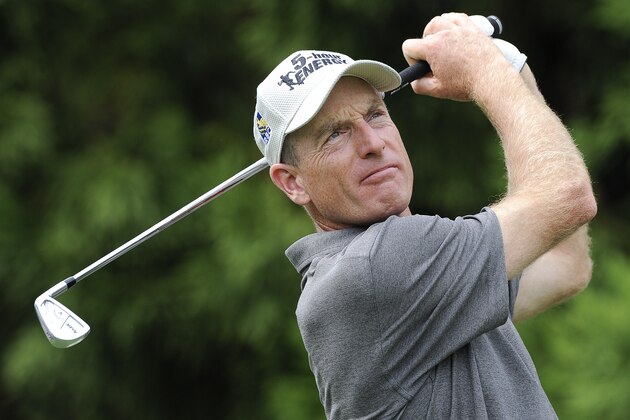 Jim Furyk hits from the tee on the second hole during the third round of play in the Tour Championship golf tournament  Saturday, Sept. 13, 2014, in Atlanta. (AP Photo/John Amis)