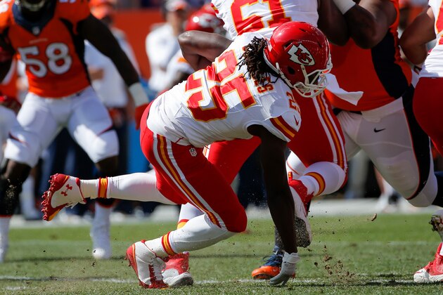 DENVER, CO - SEPTEMBER 14:  Running back Jamaal Charles #25 of the Kansas City Chiefs goes down on a 2 yard rush in the first quarter of a game against the Denver Broncos at Sports Authority Field at Mile High on September 14, 2014 in Denver, Colorado.  (Photo by Doug Pensinger/Getty Images)