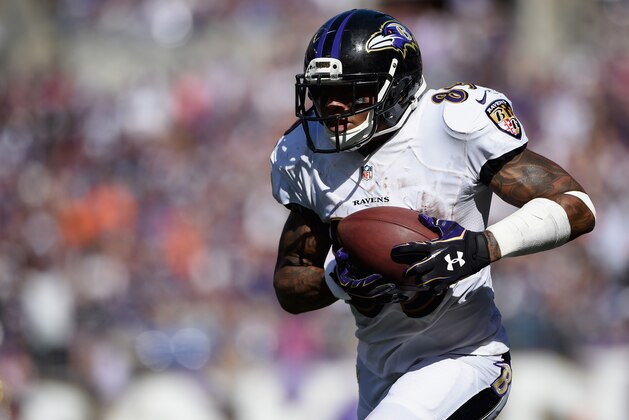 BALTIMORE, MD - SEPTEMBER 07: Wide receiver Steve Smith #89 of the Baltimore Ravens runs after a catch during an NFL football game against the Cincinnati Bengals at M&T Bank Stadium on September 7, 2014 in Baltimore, Maryland.  (Photo by Patrick Smith/Getty Images)