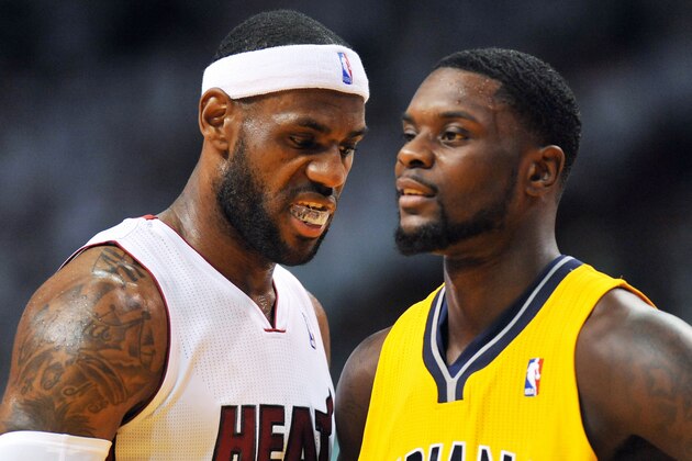 May 30, 2014; Miami, FL, USA; Miami Heat forward LeBron James (6) stands next to Indiana Pacers guard Lance Stephenson (1) in game six of the Eastern Conference Finals of the 2014 NBA Playoffs at American Airlines Arena. Mandatory Credit: Steve Mitchell-USA TODAY Sports