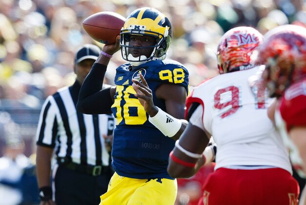 Sep 13, 2014; Ann Arbor, MI, USA; Michigan Wolverines quarterback Devin Gardner (98) passes the ball against the Miami (Oh) Redhawks in the first half at Michigan Stadium. Mandatory Credit: Rick Osentoski-USA TODAY Sports