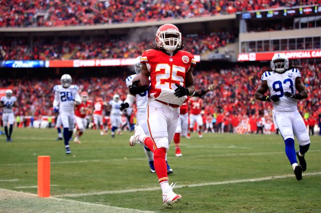 KANSAS CITY, MO - DECEMBER 22:  Running back Jamaal Charles #25 of the Kansas City Chiefs carries the ball across the goal line for a touchdwon during the game against the Indianapolis Colts at Arrowhead Stadium on December 22, 2013 in Kansas City, Missouri.  (Photo by Jamie Squire/Getty Images)