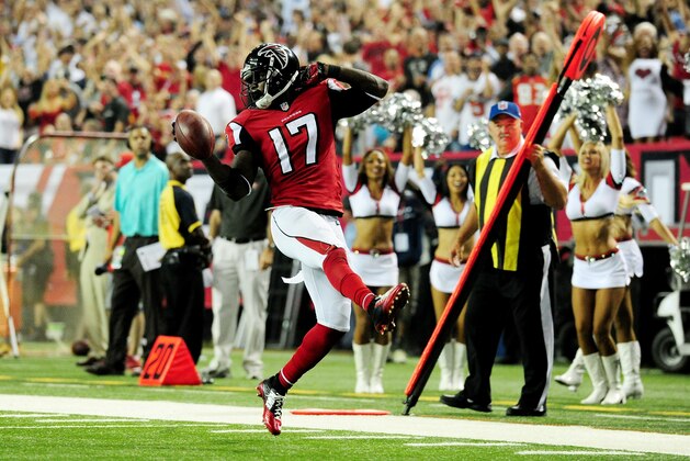 ATLANTA, GA - SEPTEMBER 18:  Wide receiver Devin Hester #17 of the Atlanta Falcons returns a punt for a touchdown against the Tampa Bay Buccaneers during a game at the Georgia Dome on September 18, 2014 in Atlanta, Georgia.  (Photo by Scott Cunningham/Getty Images)