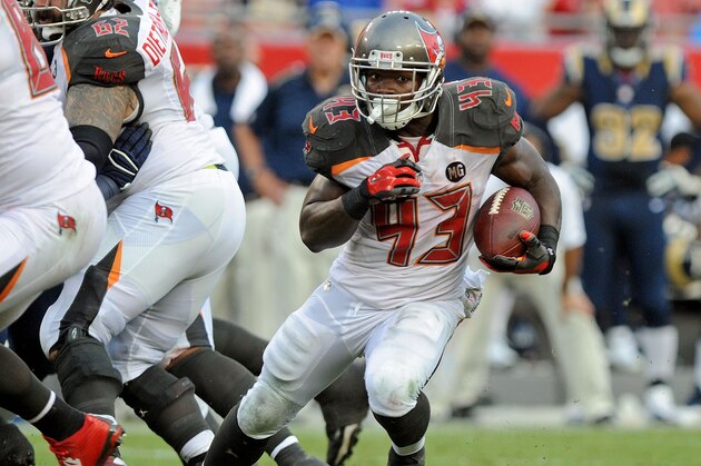 TAMPA, FL - SEPTEMBER 14: Bobby Rainey #43 of the Tampa Bay Buccaneers rushes during the second quarter of the game against the St. Louis Rams at Raymond James Stadium on September 14, 2014 in Tampa, Florida.  (Photo by Cliff McBride/Getty Images)